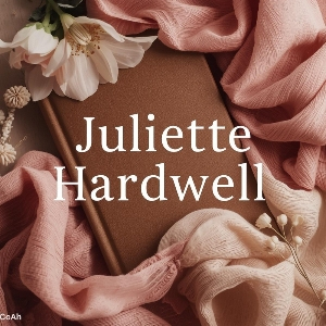 Soft romantic author desk flatlay on cream with blush petals and gold pen