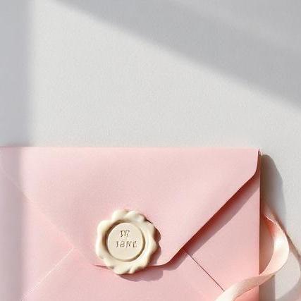 Open book with golden heart-shaped locket chain